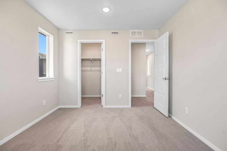 Spacious, unfurnished interior of a new home in Barefoot Village, Firestone (Image 15).
