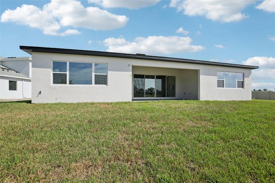 Exterior details and patio area of a home in Biscayne Landing at Seaire, Parrish (Image 3).
