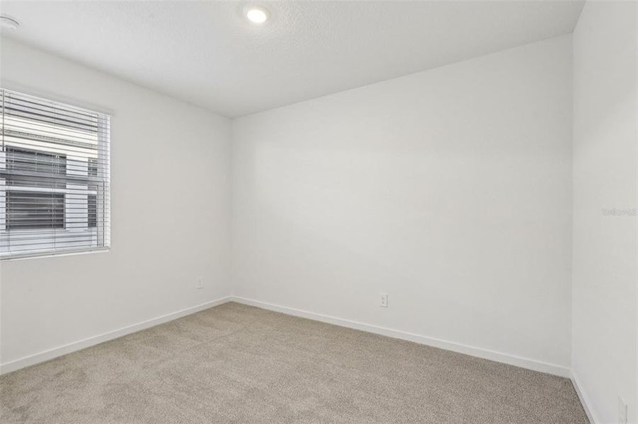 Spacious, unfurnished interior of a new home in Colbert Landings, Palm Coast (Image 25).