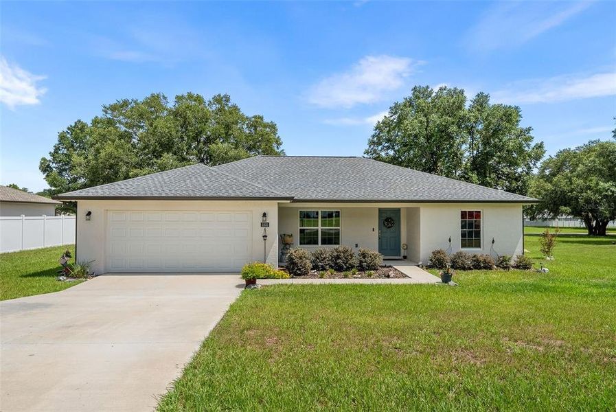 Front exterior of a new home in Citra Highland, Citra, FL, highlighting curb appeal (Image 1). Front exterior of a new home in Citra Highland, Citra, FL, highlighting curb appeal (Image 1).