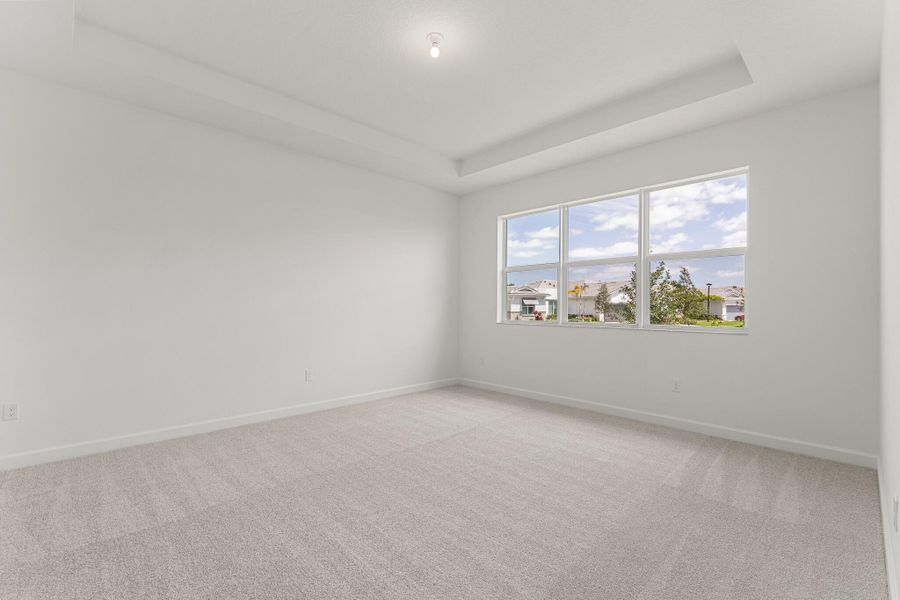 Spacious, unfurnished interior of a new home in Tradition - Telaro, Port St. Lucie (Image 9).