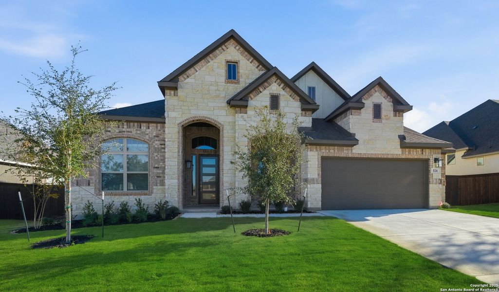 Front exterior of a new home in Mesa Western, Cibolo, TX, highlighting curb appeal (Image 23).