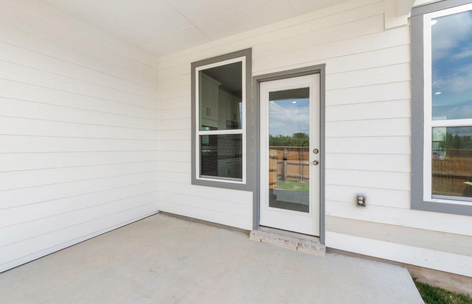 Front exterior of a new home in Northpoint at Old Settlers, Round Rock, TX, highlighting curb appeal (Image 2). Front exterior of a new home in Northpoint at Old Settlers, Round Rock, TX, highlighting curb appeal (Image 2).