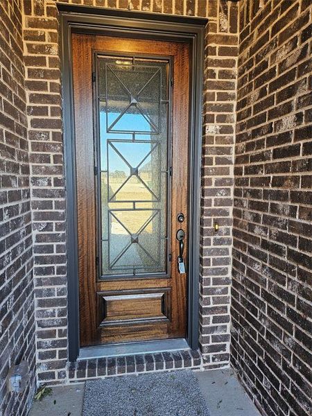 Exterior details and patio area of a home in Pecan Grove, Whitesboro (Image 2). Exterior details and patio area of a home in Pecan Grove, Whitesboro (Image 2).