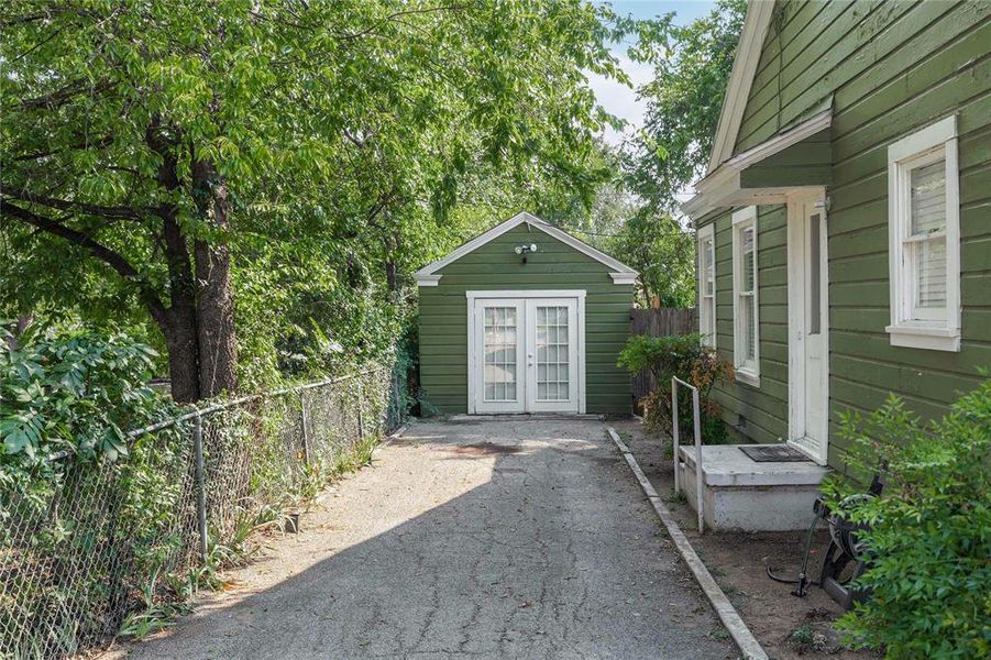 View of patio / terrace with an outdoor structure View of patio / terrace with an outdoor structure