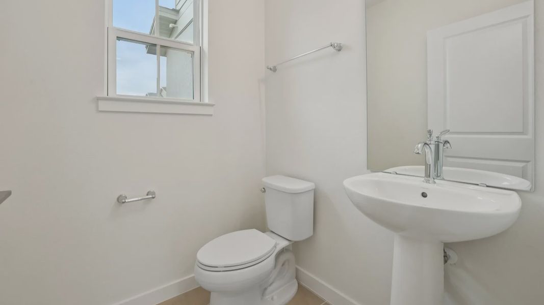 Guest Bath of the Coronado - End at Cyrene at Harmony located in St Cloud FL by DRB Homes