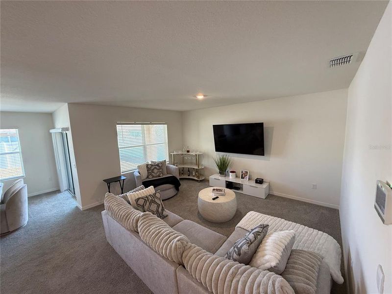 Furnished interior view inside a new home in Cypress Park Estates, Haines City (Image 7).
