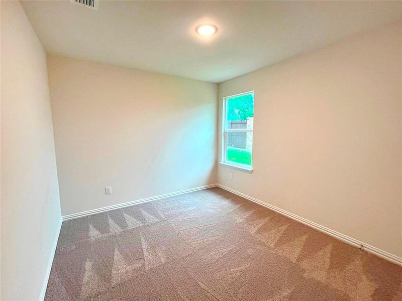 Spacious, unfurnished interior of a new home in Labein Villas, Greenville (Image 17).