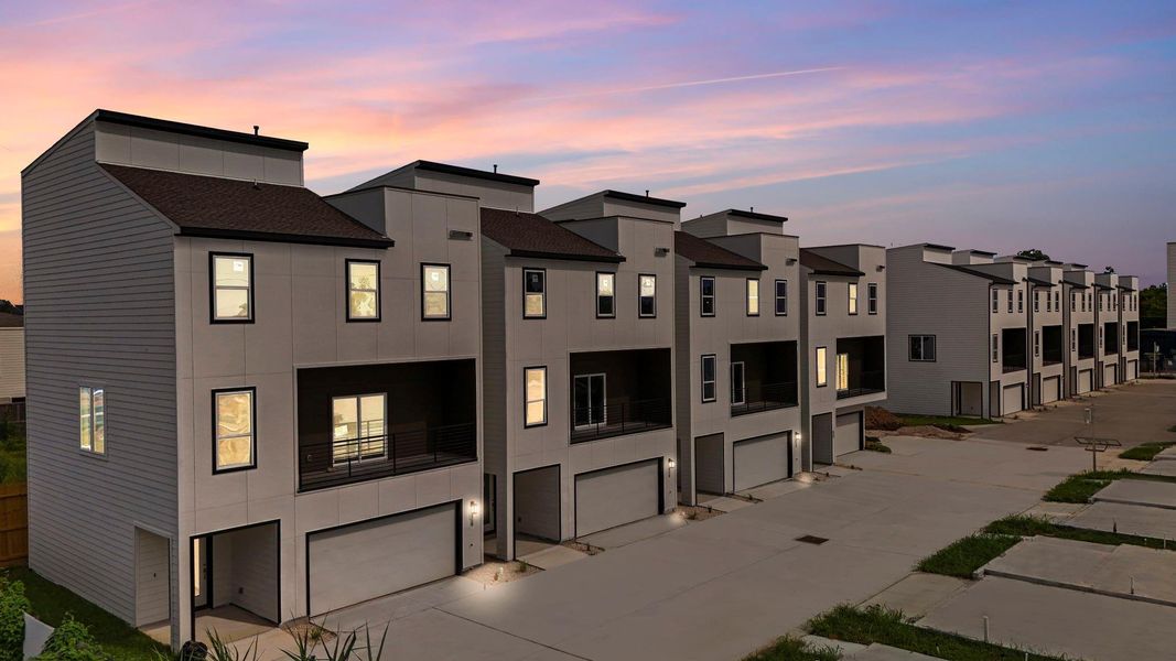 Modern 3-story home featuring a private first-floor bedroom with full bath, open-concept kitchen/living/dining on the second floor plus office space, and two bedrooms and an en-suite bath upstairs. Enjoy panoramic views from the rooftop terrace—perfect for relaxing or entertaining. Modern 3-story home featuring a private first-floor bedroom with full bath, open-concept kitchen/living/dining on the second floor plus office space, and two bedrooms and an en-suite bath upstairs. Enjoy panoramic views from the rooftop terrace—perfect for relaxing or entertaining.