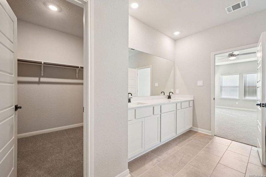 Furnished interior view inside a new home in Estancia Ranch - Classic Series, San Antonio (Image 18).