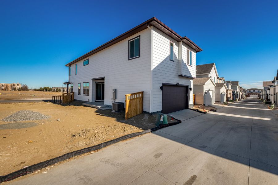 Exterior details and patio area of a home in Arras Park, Thornton (Image 20).