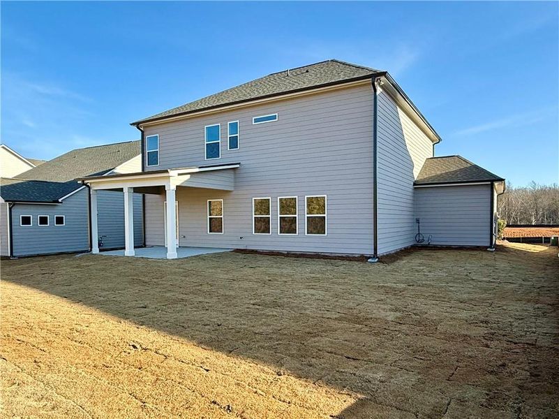Exterior details and patio area of a home in Ponderosa Farms Manor, Gainesville (Image 27).