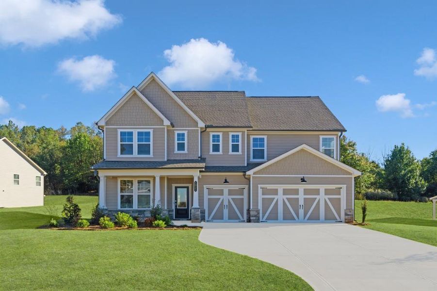 Front exterior of a new home in Wellington Estates, Madison, GA, highlighting curb appeal (Image 1). Front exterior of a new home in Wellington Estates, Madison, GA, highlighting curb appeal (Image 1).