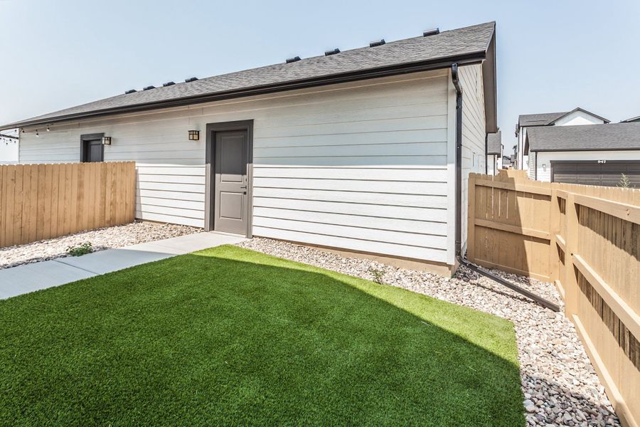 Exterior details and patio area of a home in Prairie Song, Windsor (Image 29). Exterior details and patio area of a home in Prairie Song, Windsor (Image 29).