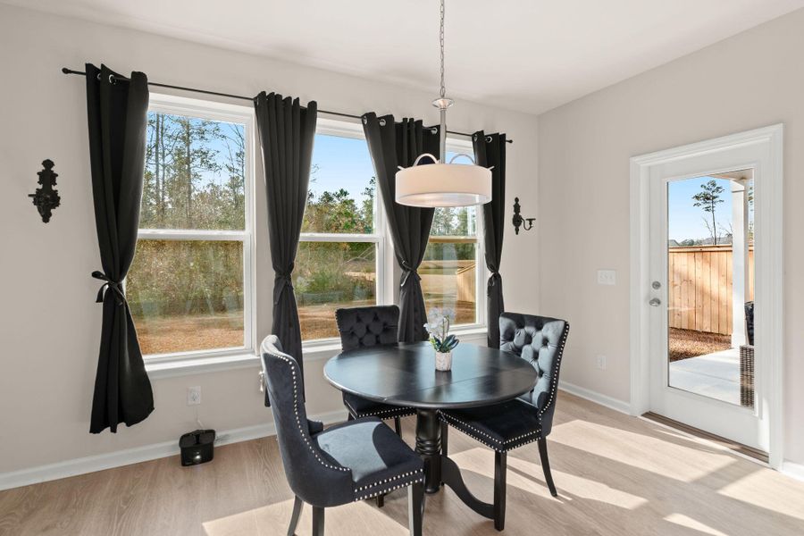 Furnished interior view inside a new home in Jasmine Point at Lakes of Cane Bay, Summerville (Image 13).