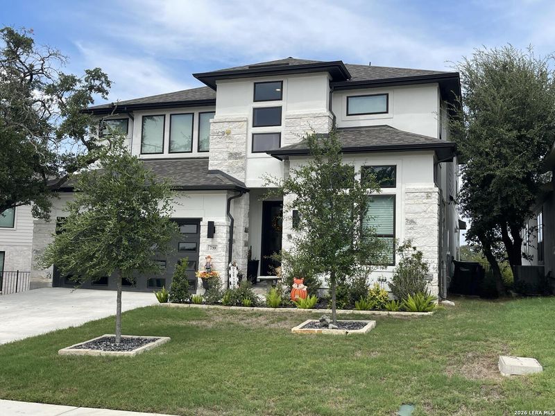 Front exterior of a new home in Vista Alta Del Veramendi, New Braunfels, TX, highlighting curb appeal (Image 2). Front exterior of a new home in Vista Alta Del Veramendi, New Braunfels, TX, highlighting curb appeal (Image 2).