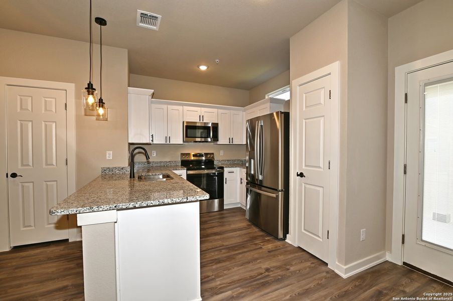 Furnished interior view inside a new home in , San Antonio (Image 3).