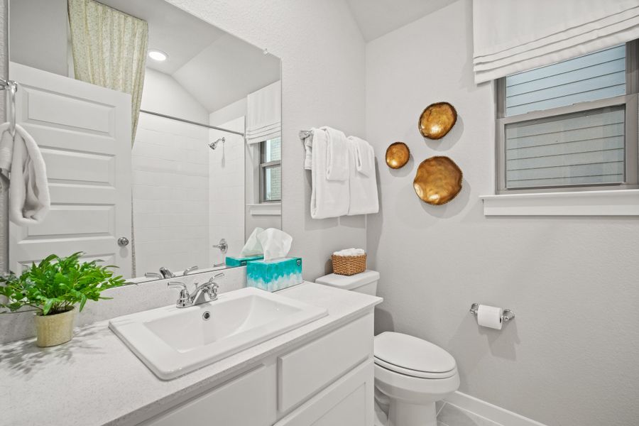 Bathroom in a Trinity Ranch Diamond Model in Elgin TX by Trophy Signature Homes