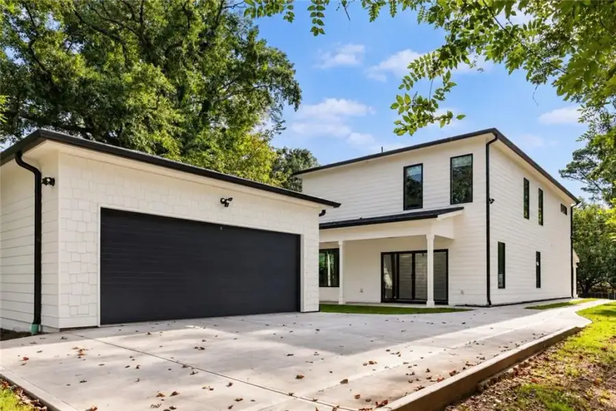 Front exterior of a new home in , Atlanta, GA, highlighting curb appeal (Image 24).