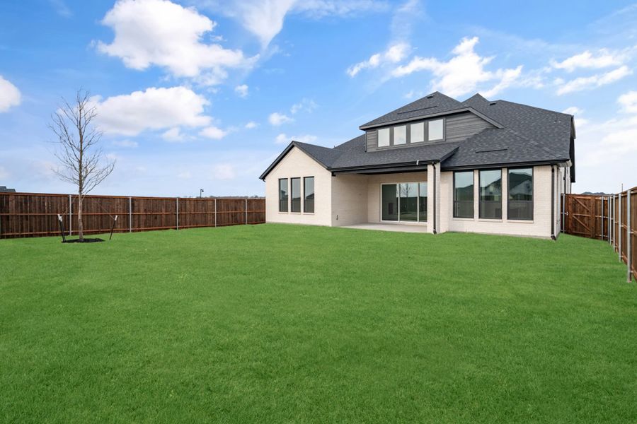 Exterior details and patio area of a home in Cambridge Crossing, Celina (Image 21).