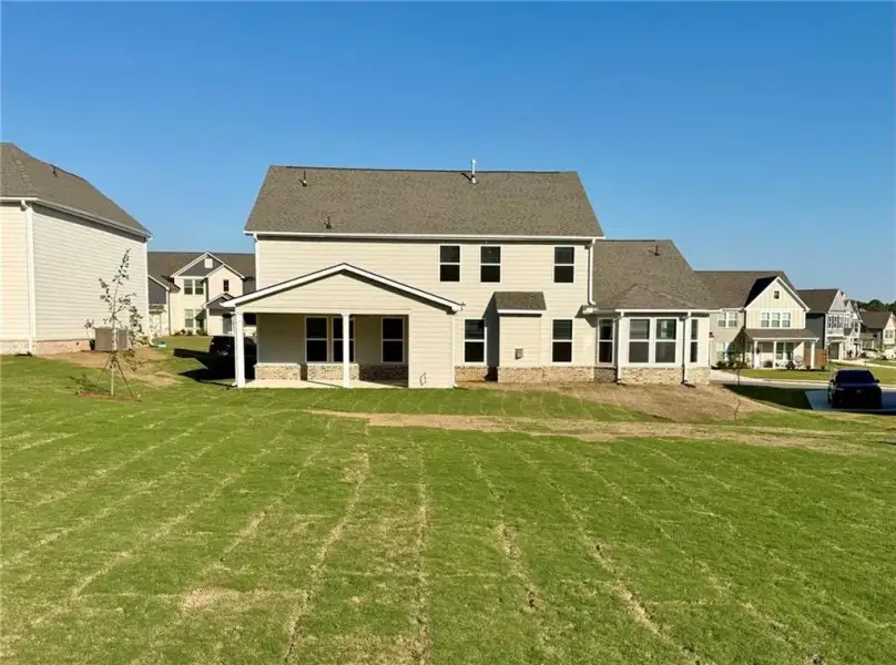 Exterior details and patio area of a home in Grandview at Millers Mill, Stockbridge (Image 18).