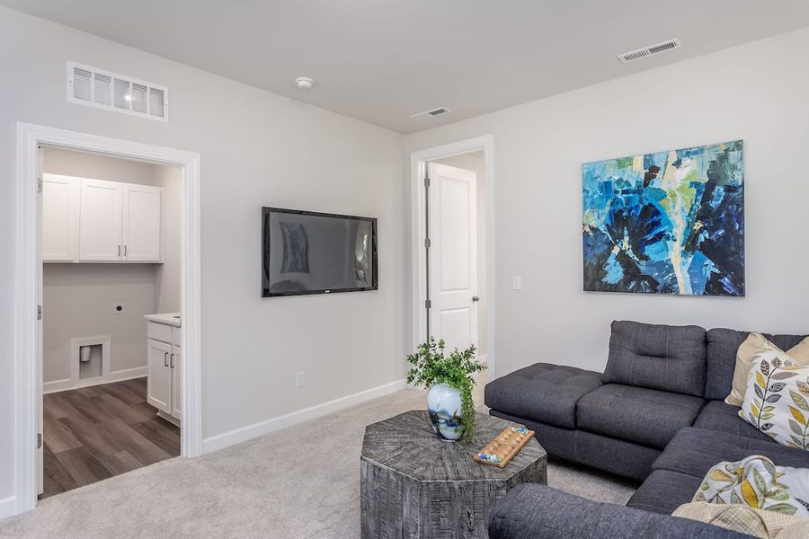 Representative furnished interior of a home built from the Silas by Tri Pointe Homes in The Townes at Willow Park, Cary (Image 10).