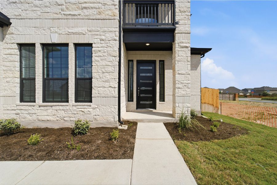 Exterior details and patio area of a home in Sunfield, Buda (Image 3). Exterior details and patio area of a home in Sunfield, Buda (Image 3).