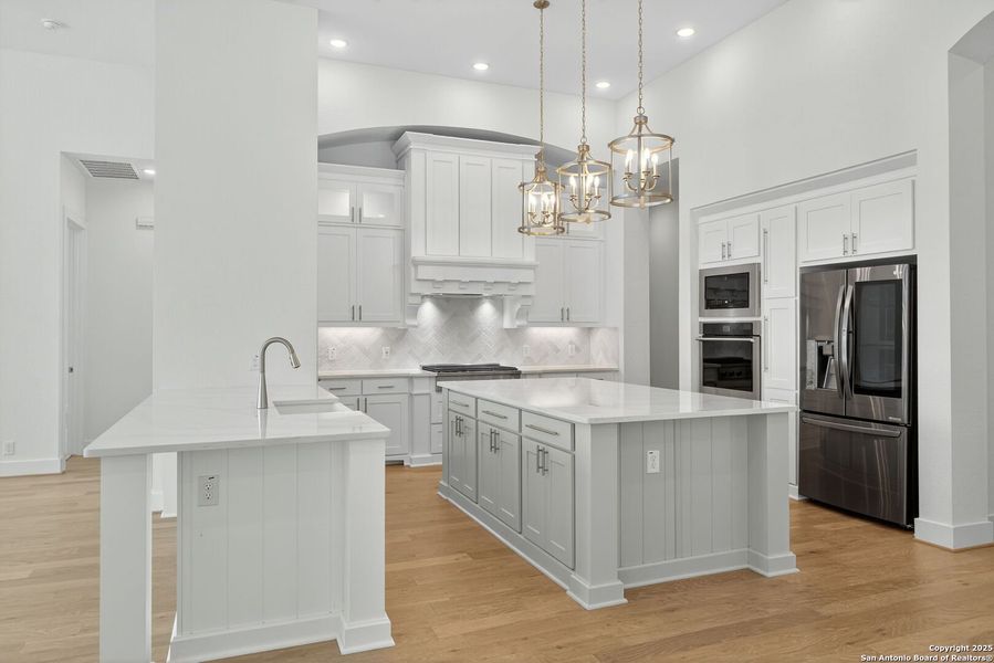Furnished interior view inside a new home in Front Gate in Fair Oaks Ranch, Fair Oaks Ranch (Image 15). Furnished interior view inside a new home in Front Gate in Fair Oaks Ranch, Fair Oaks Ranch (Image 15).