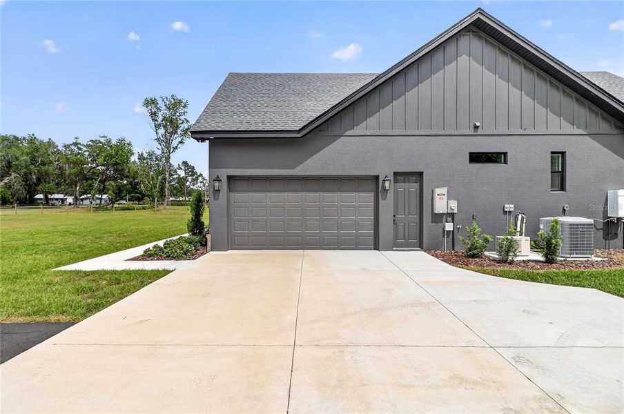 Front exterior of a new home in , Lakeland, FL, highlighting curb appeal (Image 28).