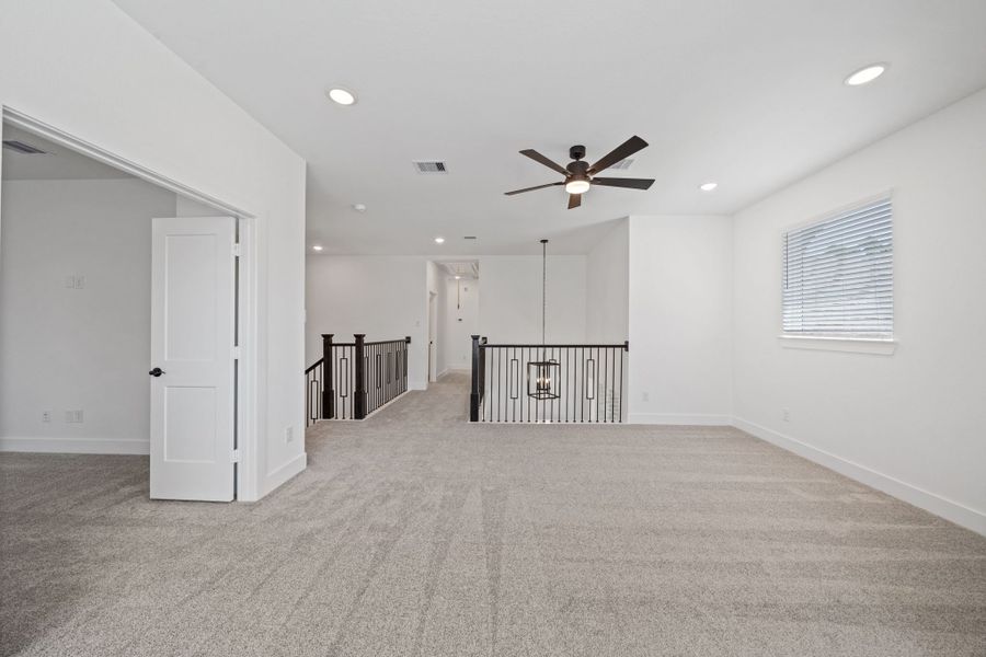 Representative unfurnished interior of a home built from the Waterloo 60′ Lot by Chesmar Homes in Fulshear Lakes, Fulshear (Image 34).