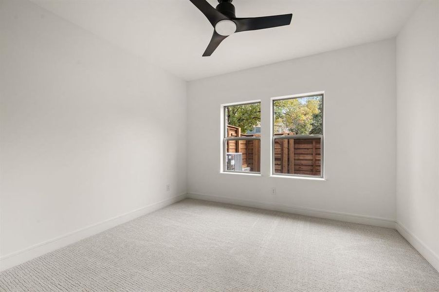 Your guests will enjoy this spacious, main level secondary bedroom with adjacent bath. Your guests will enjoy this spacious, main level secondary bedroom with adjacent bath.