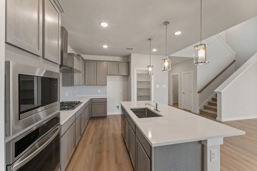 Representative unfurnished interior of a home built from the Poinsettia by Hakes Brothers in Veranda Signature, San Antonio (Image 15). Representative unfurnished interior of a home built from the Poinsettia by Hakes Brothers in Veranda Signature, San Antonio (Image 15).