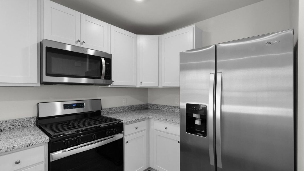 Furnished interior view inside a new home in Pine Hills Townhomes at Cane Bay, Summerville (Image 4).