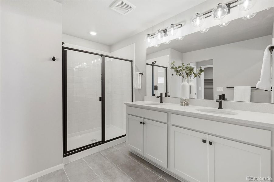 Furnished interior view inside a new home in Woodrose at Painted Prairie, Aurora (Image 24).