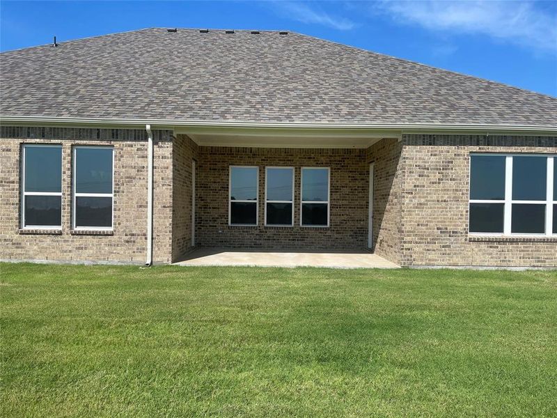 Exterior details and patio area of a home in The Ranch at Stone Hill, Waxahachie (Image 4).