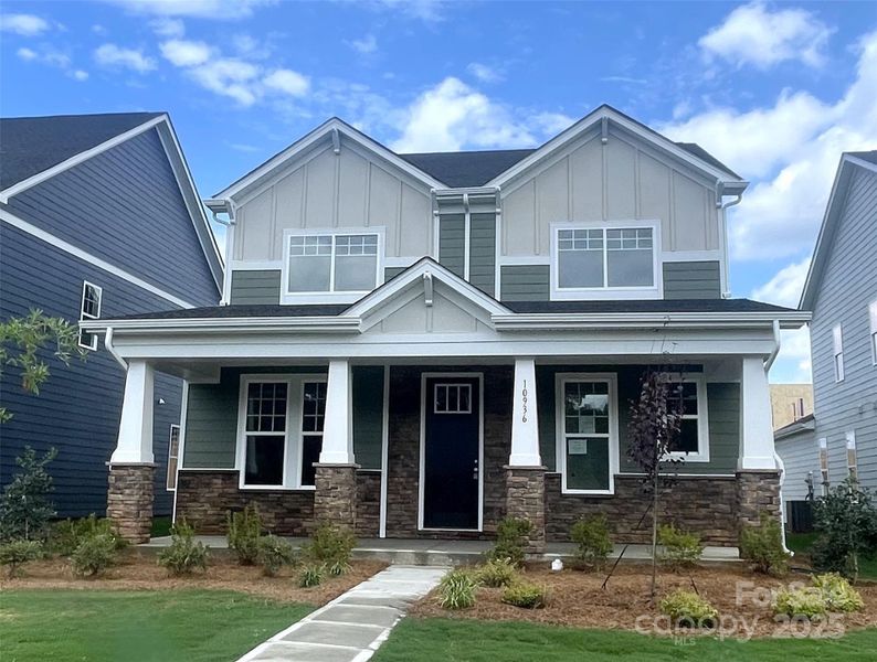 Front exterior of a new home in Edgewood Preserve, Huntersville, NC, highlighting curb appeal (Image 1). Front exterior of a new home in Edgewood Preserve, Huntersville, NC, highlighting curb appeal (Image 1).