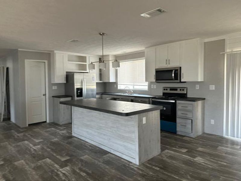 Furnished interior view inside a new home in , Pawnee (Image 3).