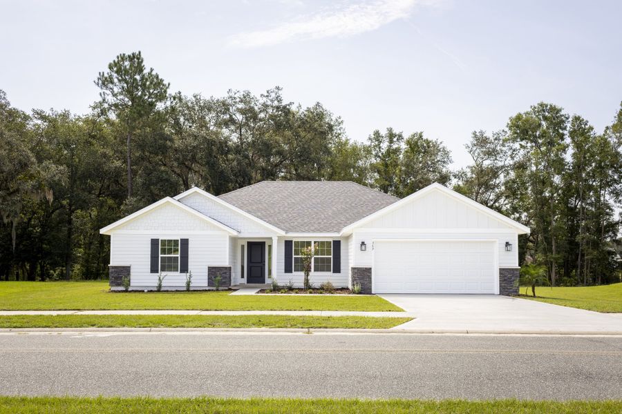 Front exterior of a new home in The Preserve at Laurel Lake, Lake City, FL, highlighting curb appeal (Image 1). Front exterior of a new home in The Preserve at Laurel Lake, Lake City, FL, highlighting curb appeal (Image 1).