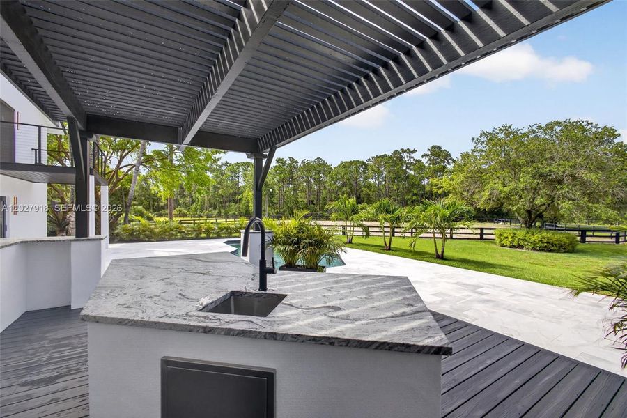 Exterior details and patio area of a home in , Palm Beach Gardens (Image 44).