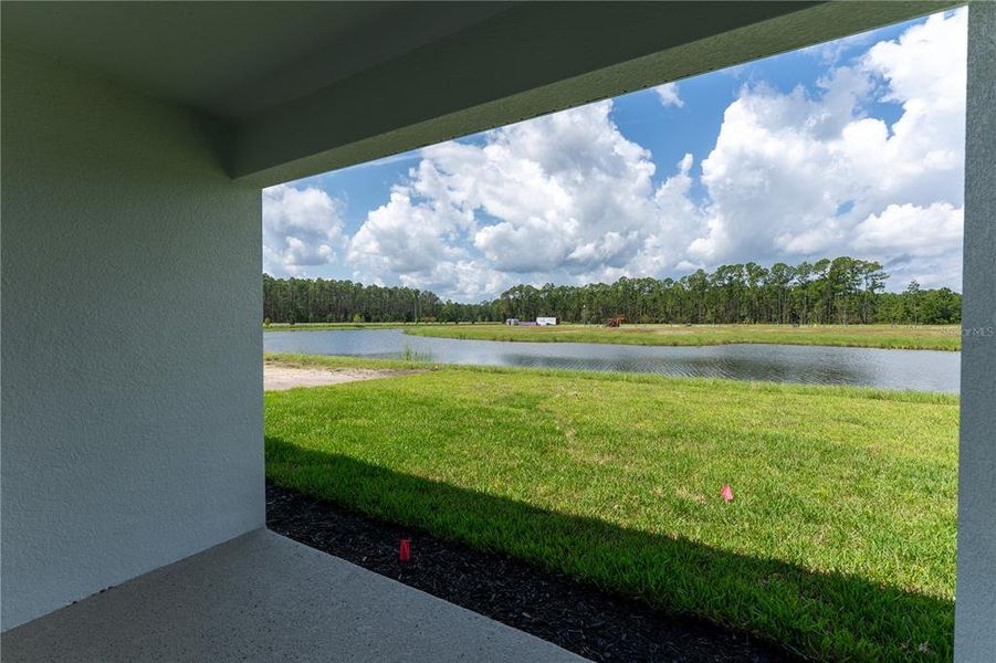 Exterior details and patio area of a home in The Palms at Venetian Bay, New Smyrna Beach (Image 3).