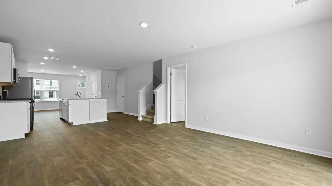 Spacious, unfurnished interior of a new home in Pine Hills Townhomes at Cane Bay, Summerville (Image 20). Spacious, unfurnished interior of a new home in Pine Hills Townhomes at Cane Bay, Summerville (Image 20).