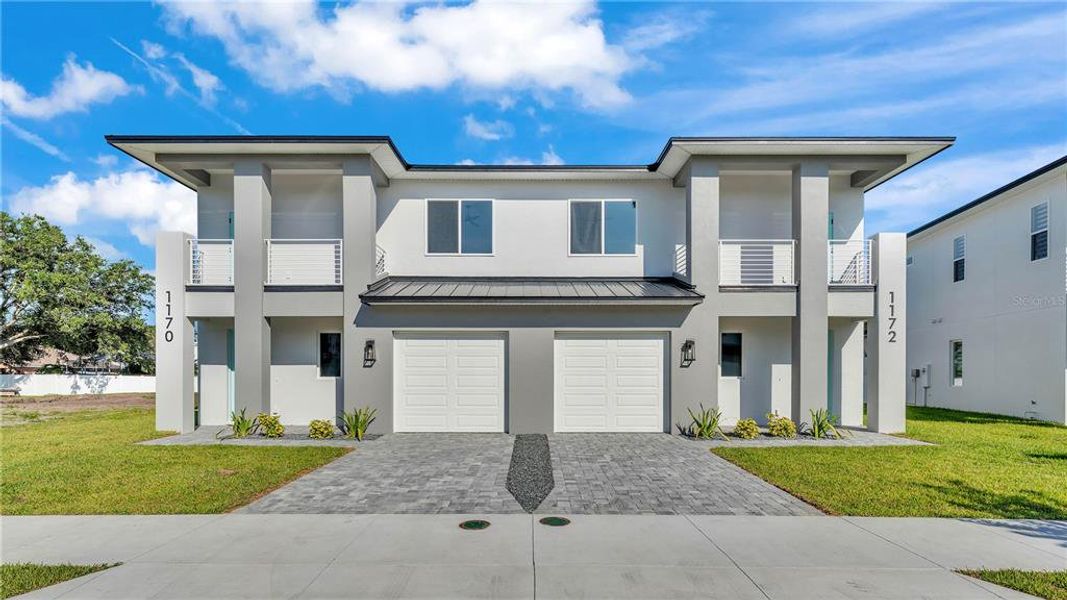 Front exterior of a new home in , Lakeland, FL, highlighting curb appeal (Image 1). Front exterior of a new home in , Lakeland, FL, highlighting curb appeal (Image 1).