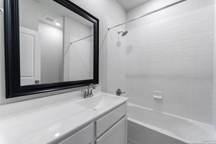 Furnished interior view inside a new home in The Woodlands at Medina Hills, Mico (Image 7).