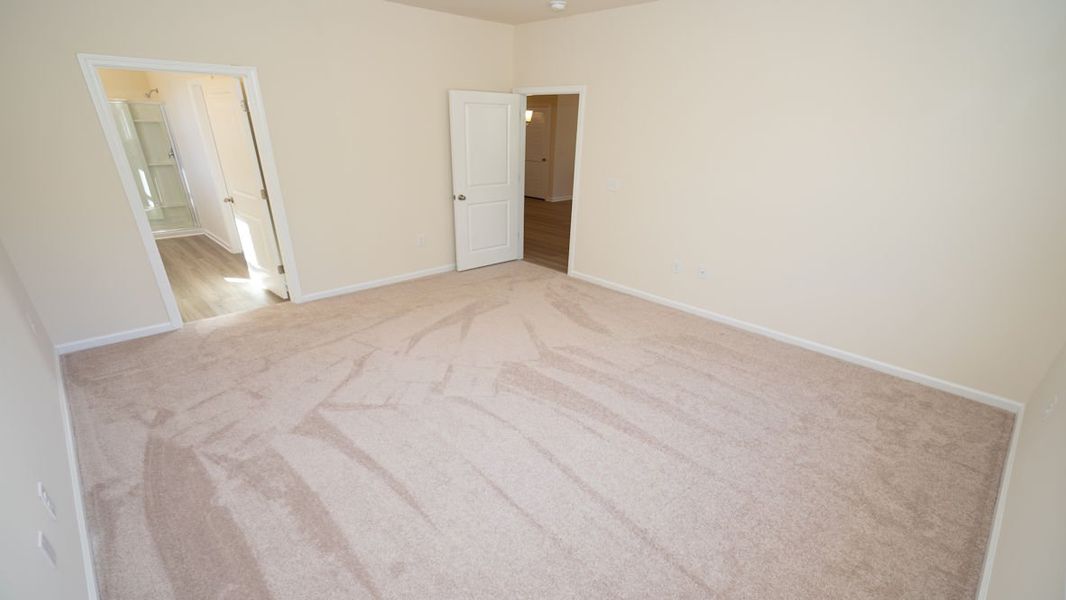 Representative unfurnished interior of a home built from the KERRY by D.R. Horton in The Reserve at Wild Horse, Conway (Image 32).