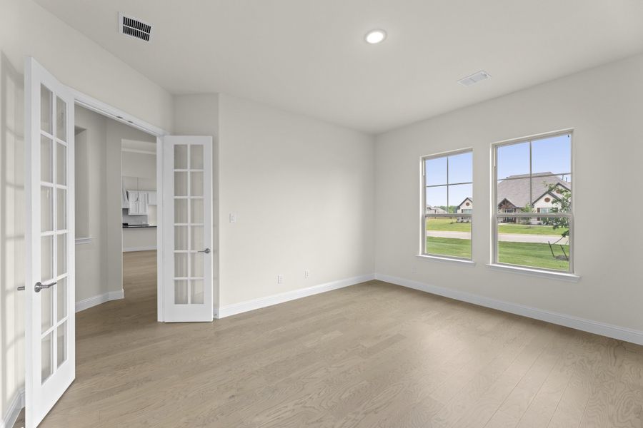 Representative unfurnished interior of a home built from the Wildwood SE by Sandlin Homes in Settler's Glen, New Fairview (Image 18).