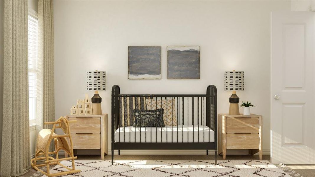 Carpeted bedroom featuring a nursery area