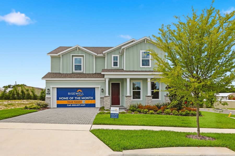Front exterior of a new home in Oakview, Apopka, FL, highlighting curb appeal (Image 2). Front exterior of a new home in Oakview, Apopka, FL, highlighting curb appeal (Image 2).