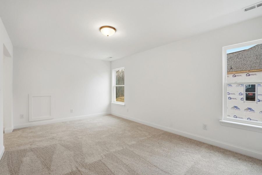 Spacious, unfurnished interior of a new home in Rone Creek, Waxhaw (Image 57).