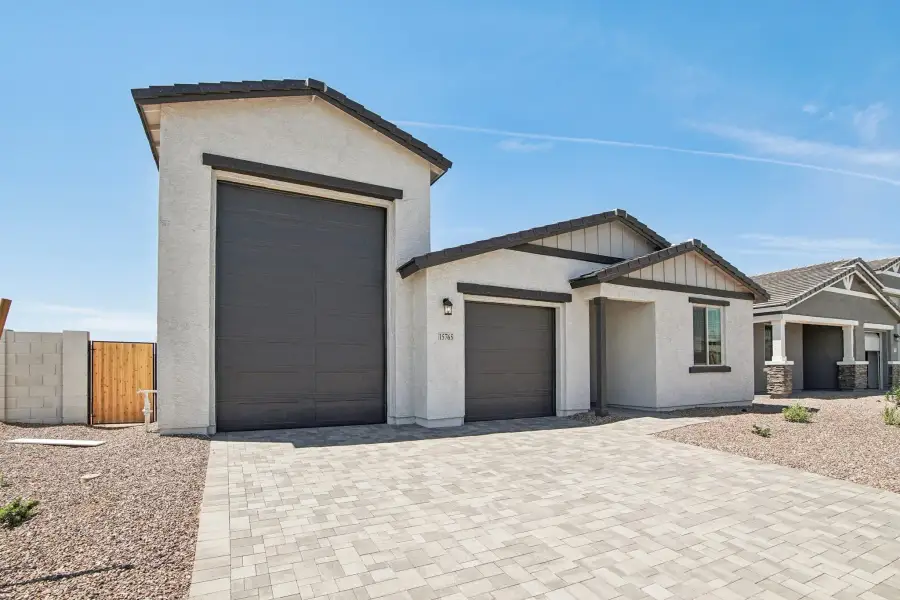 Representative exterior photo of a completed home built from the Ruby RV by Ashton Woods in La Jolla Vista, Goodyear, AZ (Image 15).