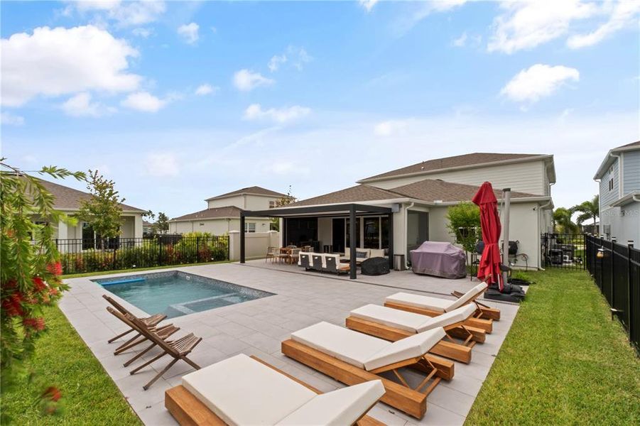 Front exterior of a new home in Willow Ridge, Montverde, FL, highlighting curb appeal (Image 18). Front exterior of a new home in Willow Ridge, Montverde, FL, highlighting curb appeal (Image 18).